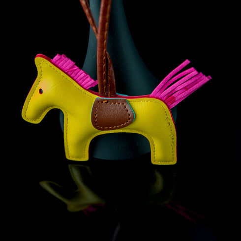 yellow leather pony